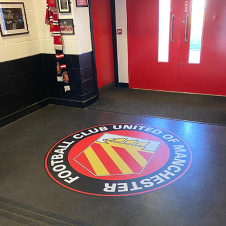 Club branding using cut to shape vinyl floor graphics