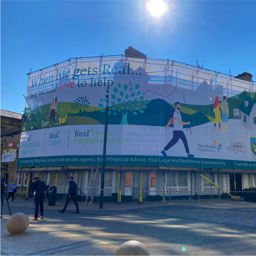 Large scale mesh banner on building site