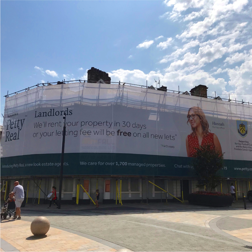 Mesh banner on redeveloped building front