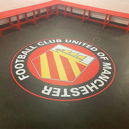 Textured vinyl floor graphics for club dressing room