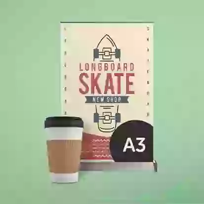 A3 desktop roller banner next to coffee cup
