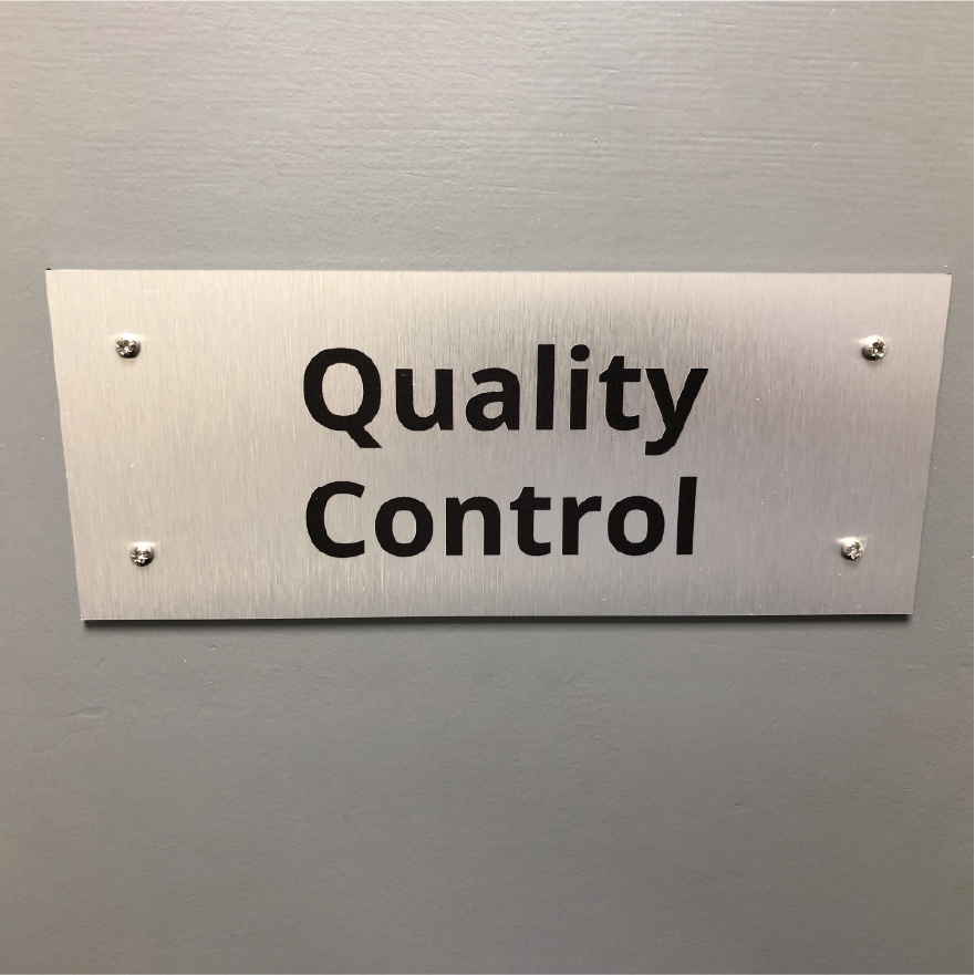 Printed brushed aluminium composite with drill holes in all corners