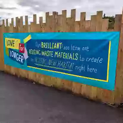 PVC banner on wooden fence
